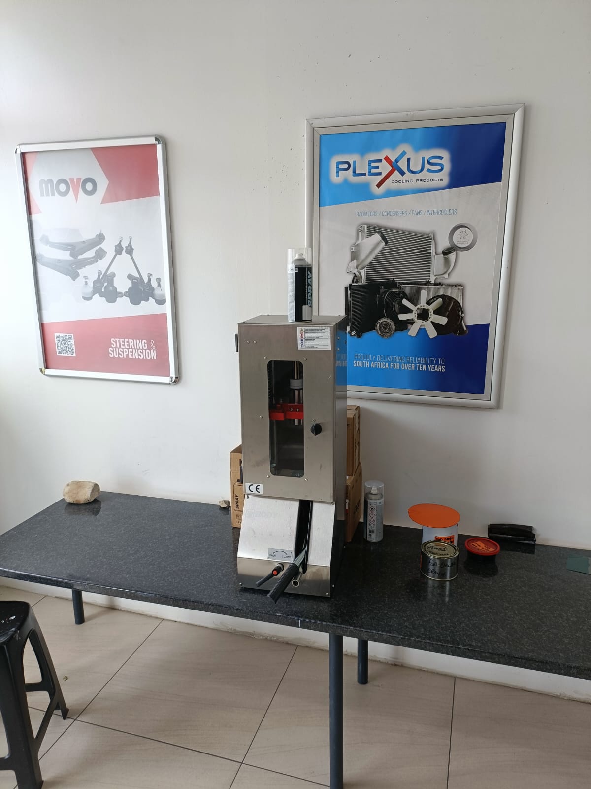 Workshop equipment and product posters inside the store