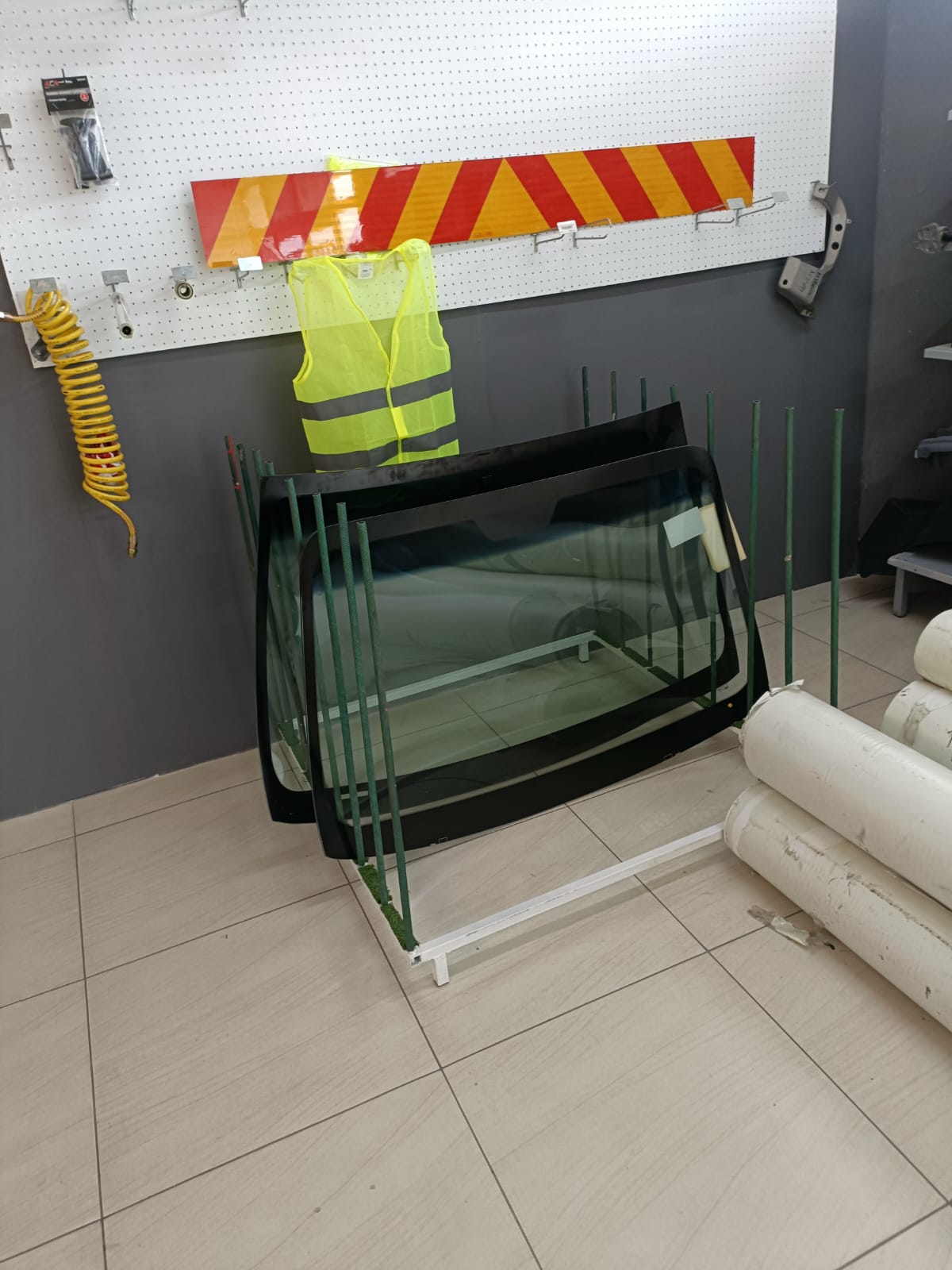 Automotive glass and safety gear displayed inside the store